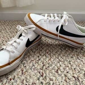 Nike White Sneakers with Black Swoosh and Brown Trim